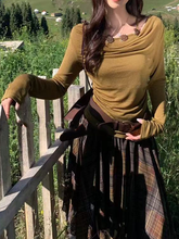 Ladies' long-sleeved halter top with neckline decoration